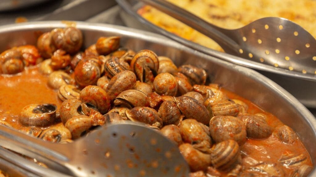 ID <a href="https://www.dreamstime.com/fresh-caragols-la-llauna-typical-catalan-snail-dish-sold-inside-mercat-de-santa-caterina-located-ribera-barcelona-spain-image312927969">312927969</a> ©
<a href="https://www.dreamstime.com/hypnocreative_info">Engin Korkmaz</a> | <a href="https://www.dreamstime.com/">Dreamstime.com</a>