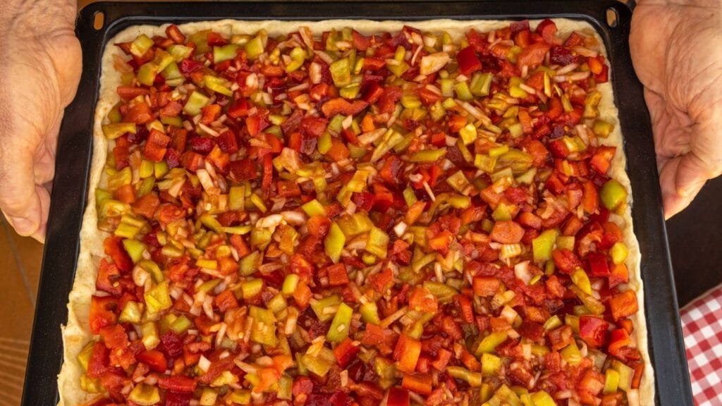ID <a href="https://www.dreamstime.com/typical-mallorcan-cuisine-dish-coca-de-trampo-close-up-typical-mallorcan-cuisine-dish-coca-de-trampo-vegetarian-healthy-image252416903">252416903</a> | <a href="https://www.dreamstime.com/photos-images/coca-mallorca.html">Coca Mallorca</a> ©
<a href="https://www.dreamstime.com/nemenfoto_info">Nemesio Jimenez Jimenez</a> | <a href="https://www.dreamstime.com/stock-photos">Dreamstime.com</a>